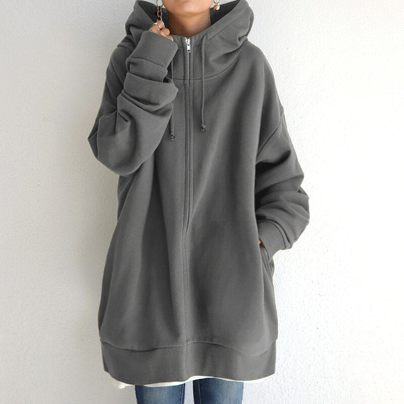 Felpa oversize con cappuccio grigio, zip frontale, maniche lunghe, stile casual. Ideale per moda autunnale e invernale, abbigliamento comodo.