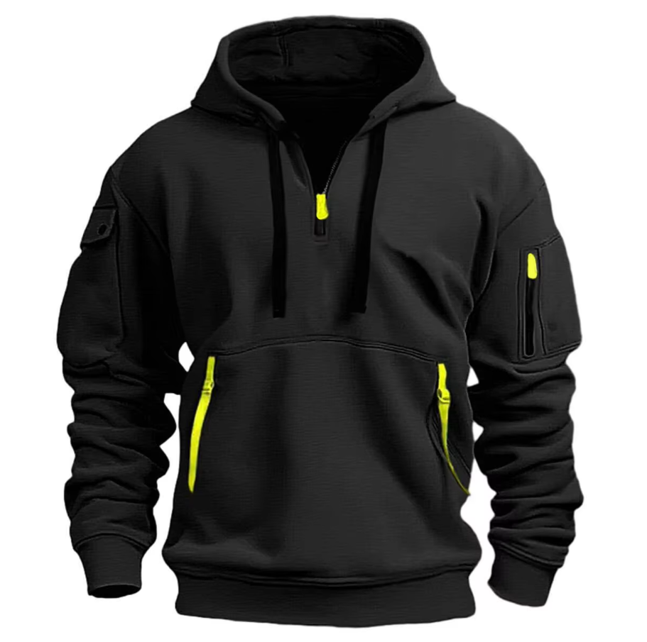 Felpa nera con cappuccio, zip gialle, tasche multiple, design sportivo. Abbigliamento casual uomo, moda autunno-inverno, stile urbano.