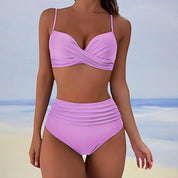 Costume da bagno donna due pezzi viola, design a vita alta, top con spalline sottili e incrocio, ideale per spiaggia e piscina.