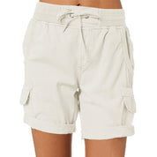 Pantaloncini cargo donna beige, cotone, con tasche laterali e coulisse in vita. Stile casual estivo, perfetti per attività all'aperto.