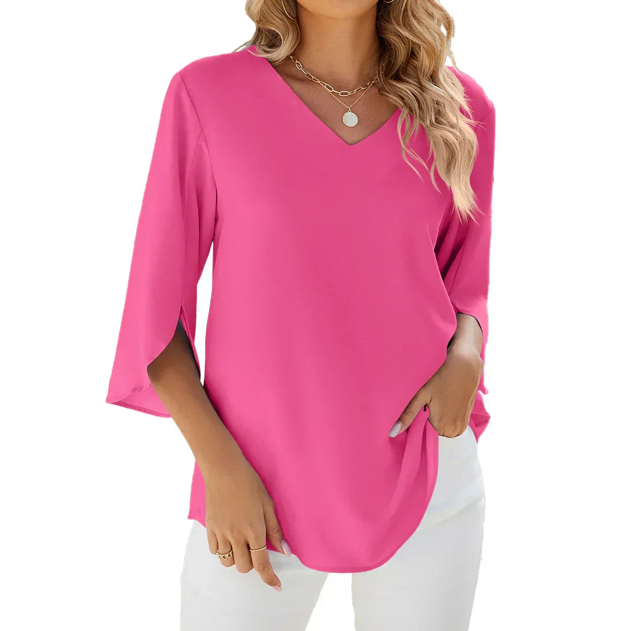 Blusa donna rosa fucsia, scollo a V, maniche a tre quarti, tessuto leggero, ideale per look casual ed eleganti. Moda femminile trendy.