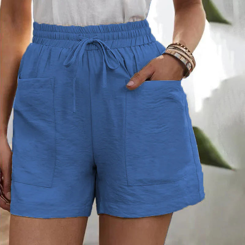 Pantaloncini donna blu con tasche, elastico in vita e laccio, tessuto leggero. Ideali per l'estate, moda casual, abbigliamento comodo.