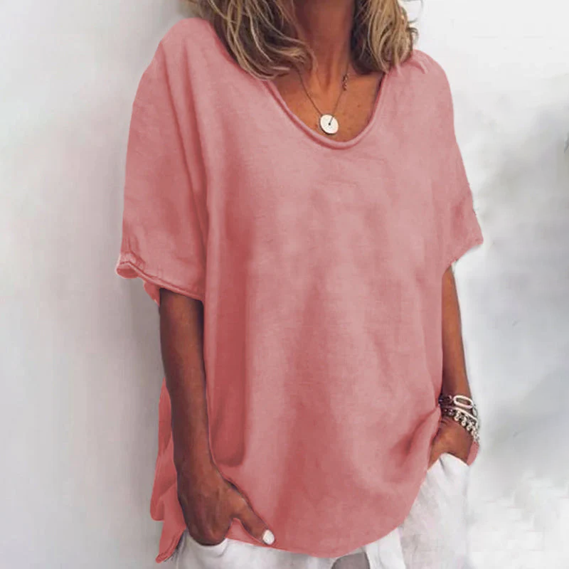 Maglietta donna rosa, maniche corte, scollo rotondo, stile casual, tessuto leggero, perfetta per l'estate. Accessori: collana e bracciali.