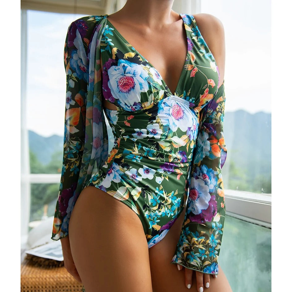 Costume intero donna floreale verde, manica lunga, scollo a V, design elegante, perfetto per spiaggia e piscina, moda mare 2023.
