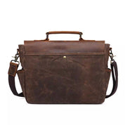 Borsa a tracolla in pelle marrone vintage, design elegante e resistente, ideale per lavoro e viaggio. Tasche multiple, chiusura sicura.