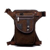 Marsupio in tela marrone con cerniere e bottoni, design vintage, ideale per escursioni e viaggi. Tasche multiple, resistente e pratico.