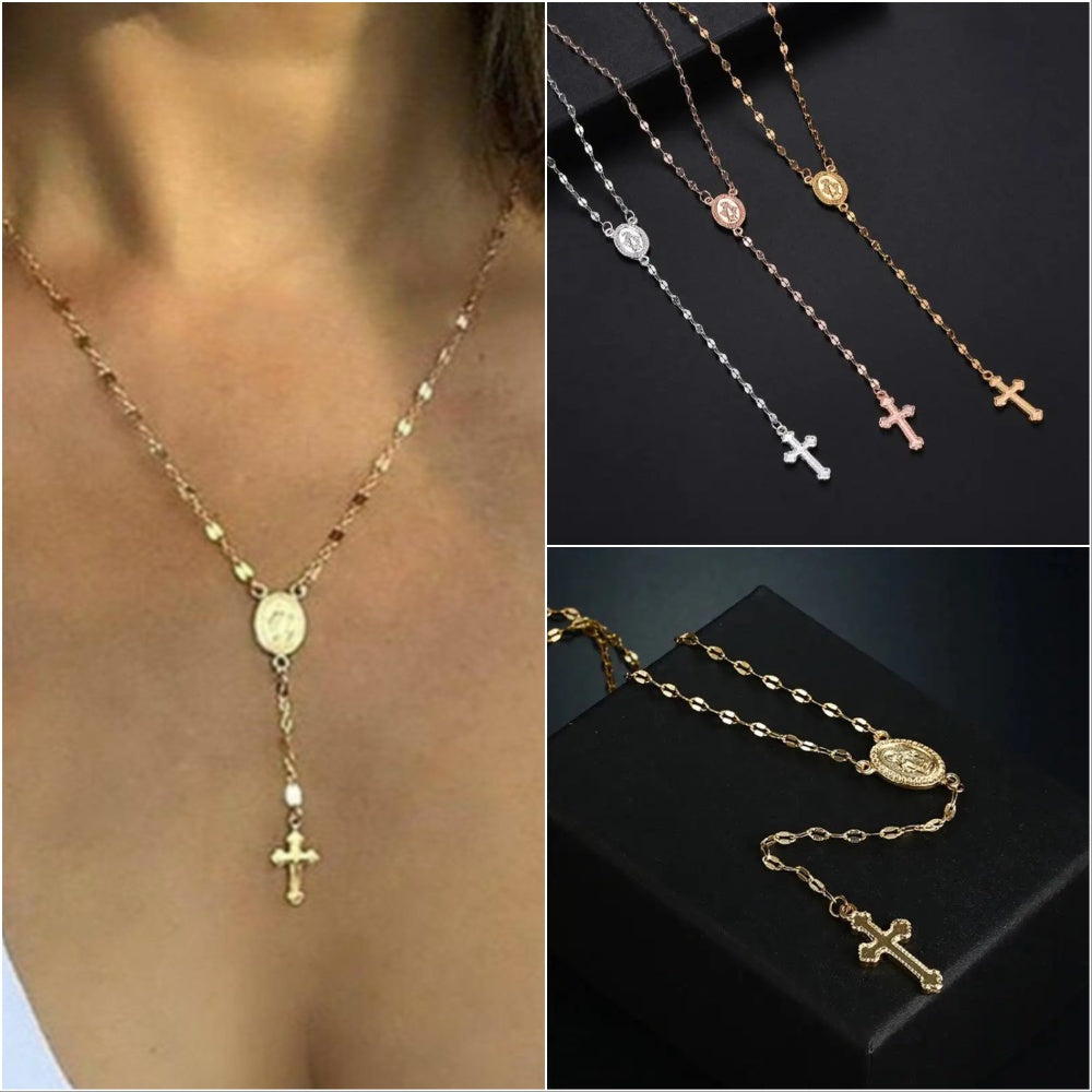 Collana rosario in oro e argento con croce pendente, design elegante e moderno, ideale per moda femminile e accessori religiosi.