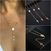 Collana rosario in oro e argento con croce pendente, design elegante e moderno, ideale per moda femminile e accessori religiosi.