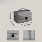 Borsa da viaggio grigia con cerniera, dimensioni 23x15,5x10 cm, manico superiore, ideale per cosmetici e accessori. Design elegante e pratico.