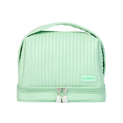 Borsa cosmetica verde menta con manico, doppia cerniera e design trapuntato. Ideale per organizzare trucchi e accessori da viaggio.