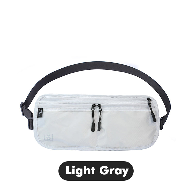 Marsupio unisex grigio chiaro con doppia cerniera, cintura regolabile nera. Accessorio moda pratico per viaggi e attività all'aperto.