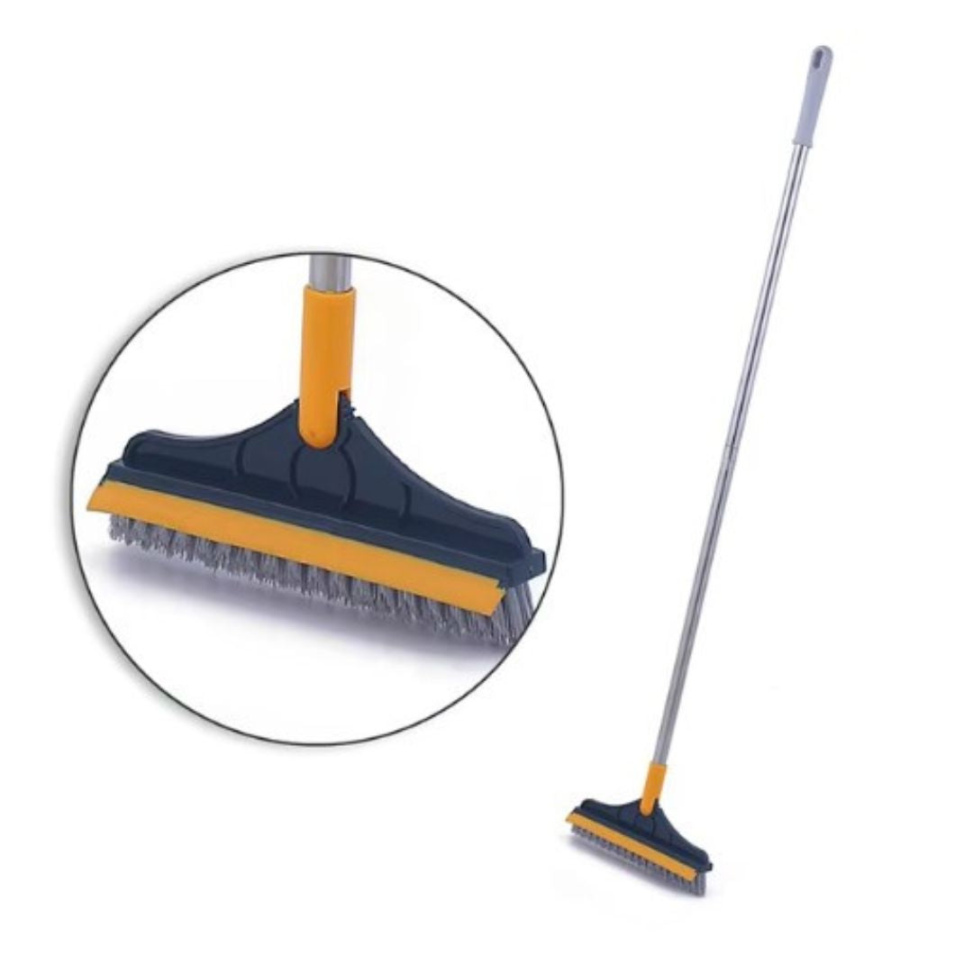 Scopa per pavimenti con setole rigide, manico lungo in metallo, ideale per pulizia interna ed esterna. Accessorio domestico resistente e versatile.