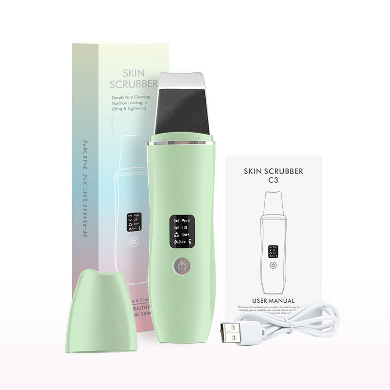 Dispositivo scrubber viso verde con scatola, manuale utente e cavo USB. Pulizia profonda, lifting e tonificazione. Accessorio skincare innovativo.
