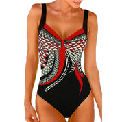 Costume intero donna nero con stampa geometrica rossa e bianca, spalline regolabili. Moda mare, abbigliamento estivo, beachwear elegante.
