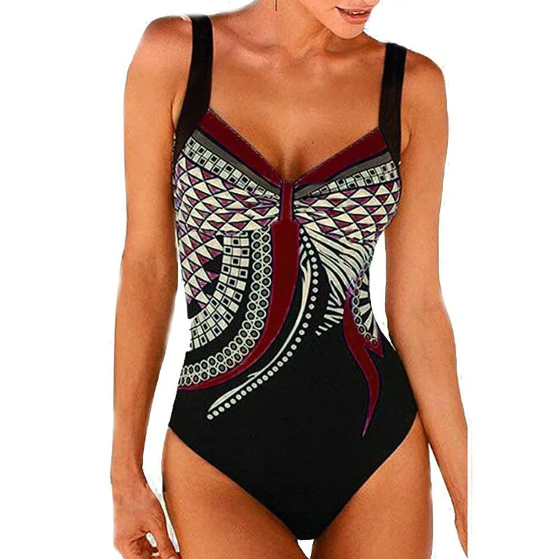 Costume intero donna nero con motivo geometrico colorato, spalline larghe. Design elegante e moderno, perfetto per la spiaggia o la piscina.