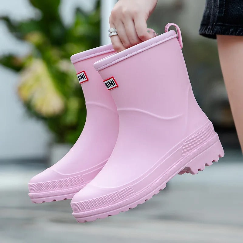 Stivali da pioggia rosa per bambini, impermeabili, suola antiscivolo, design moderno, ideali per giornate piovose, giardino, attività all'aperto.