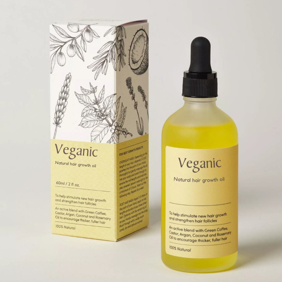 Bottiglia di olio per crescita capelli Veganic da 60ml con scatola. Formula naturale con caffè verde, argan, cocco e rosmarino. Cura capelli folti.
