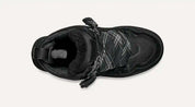 Scarpa sportiva nera vista dall'alto, con lacci intrecciati e interno imbottito. Design moderno, ideale per attività outdoor e casual.