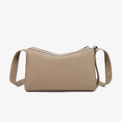 Borsa a tracolla beige in pelle, design minimalista, chiusura con zip, ideale per moda donna, accessorio elegante e versatile.